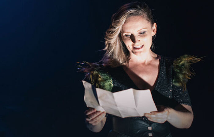 Macbeth actor reading on stage at dlr Mill Theatre