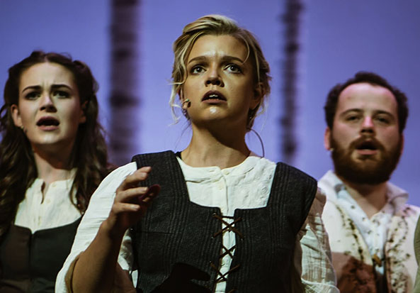 Performers on stage at dlr Mill Theatre